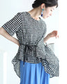 Asymmetrical blouse top with interlocking irregular dots