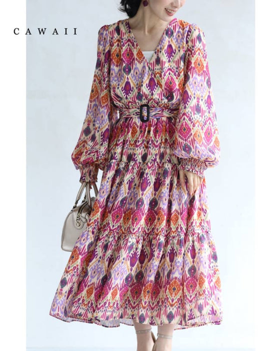 A one-piece dress that instantly brightens your look. A long dress with resort-style art print