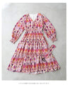 A one-piece dress that instantly brightens your look. A long dress with resort-style art print