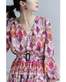 A one-piece dress that instantly brightens your look. A long dress with resort-style art print