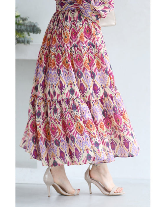 A one-piece dress that instantly brightens your look. A long dress with resort-style art print
