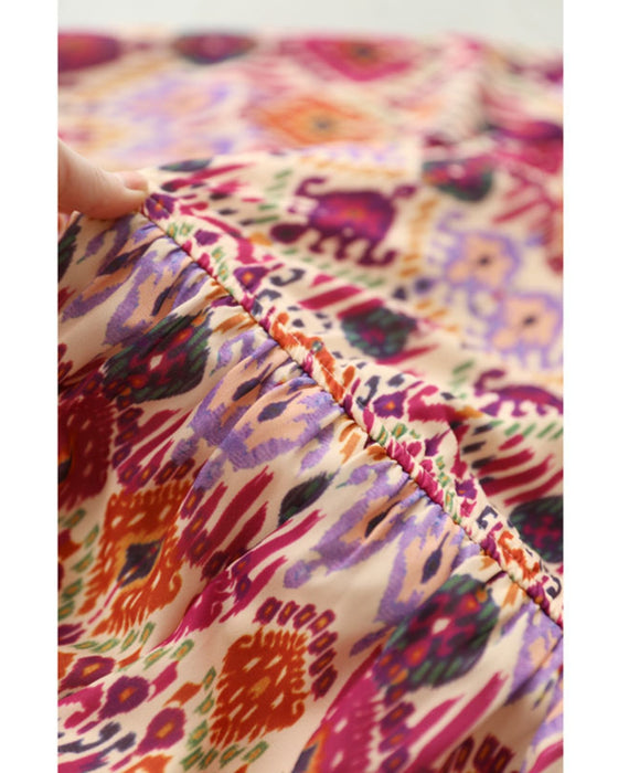 A one-piece dress that instantly brightens your look. A long dress with resort-style art print