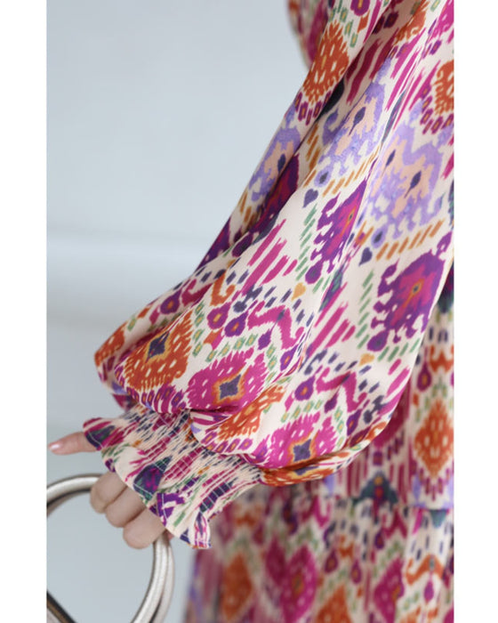 A one-piece dress that instantly brightens your look. A long dress with resort-style art print