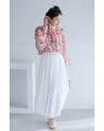 A sheer tunic top with a soft silhouette perfect for spring