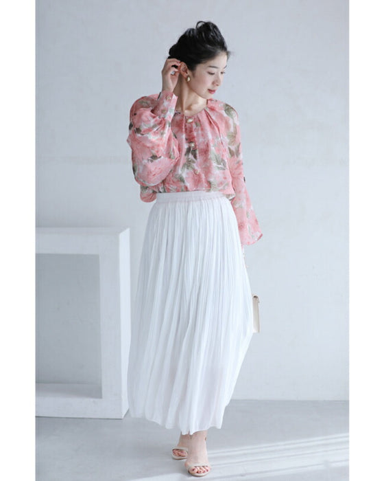 A sheer tunic top with a soft silhouette perfect for spring