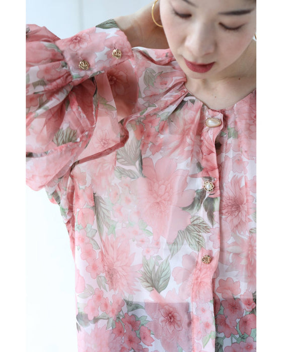 A sheer tunic top with a soft silhouette perfect for spring