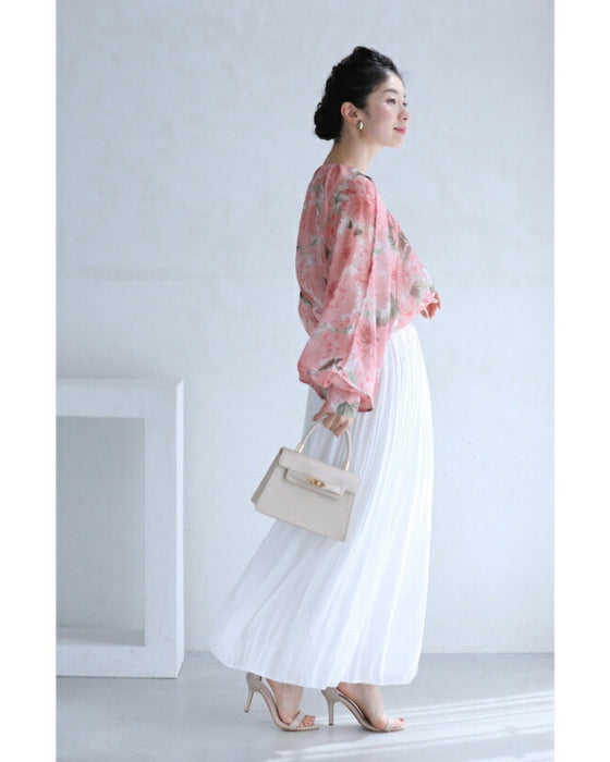 A sheer tunic top with a soft silhouette perfect for spring