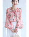 A sheer tunic top with a soft silhouette perfect for spring