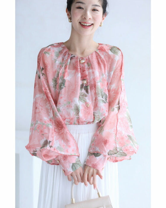 A sheer tunic top with a soft silhouette perfect for spring