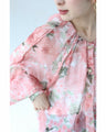 A sheer tunic top with a soft silhouette perfect for spring