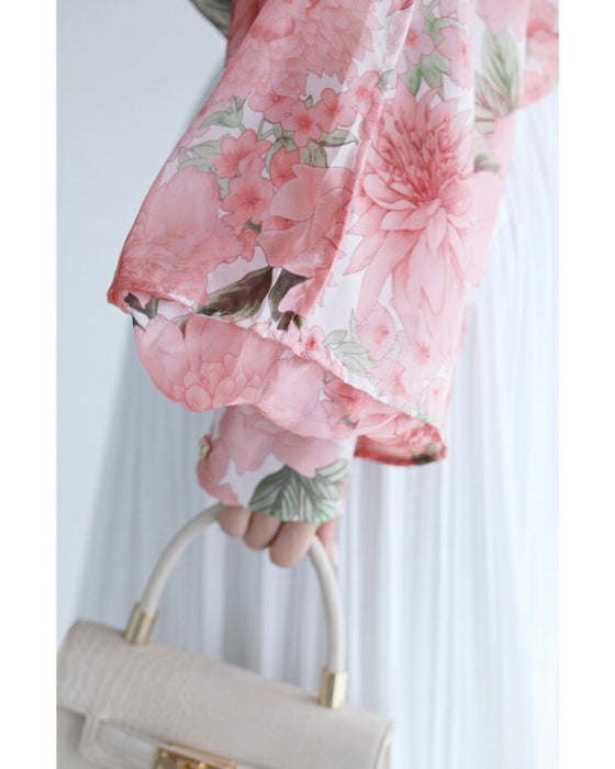 A sheer tunic top with a soft silhouette perfect for spring