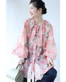 A sheer tunic top with a soft silhouette perfect for spring