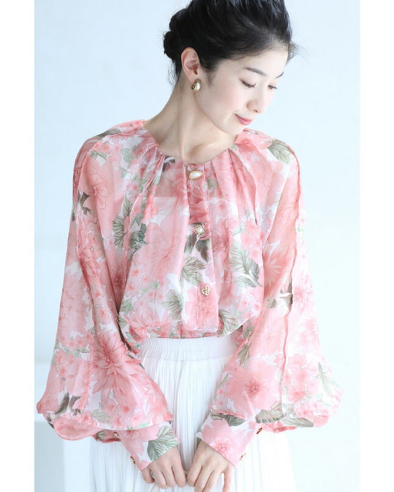 A sheer tunic top with a soft silhouette perfect for spring