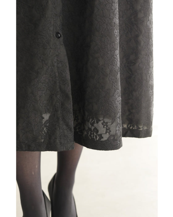 Can also be worn as a cover-up. An elegant mid-length all-lace dress