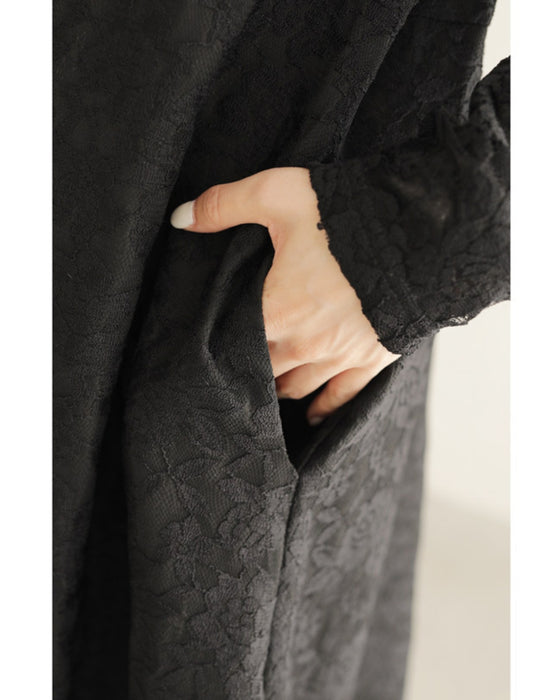 Can also be worn as a cover-up. An elegant mid-length all-lace dress