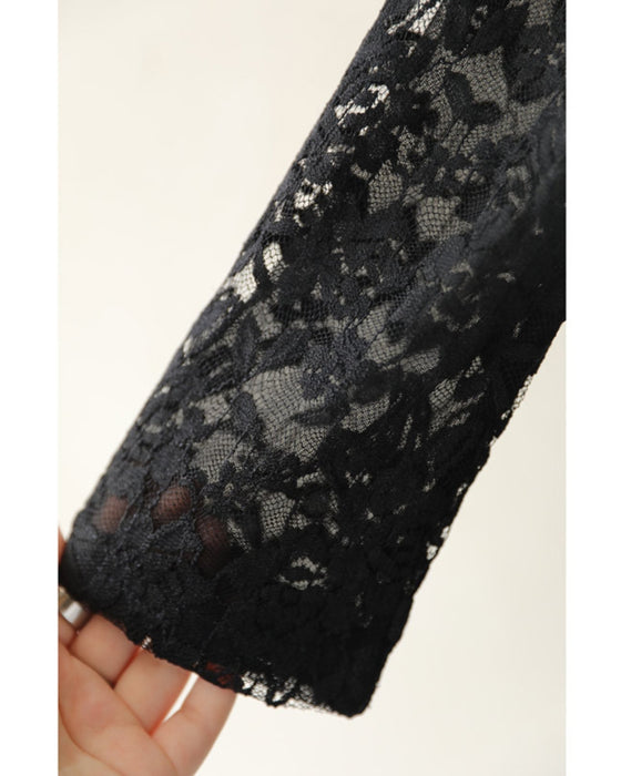 Can also be worn as a cover-up. An elegant mid-length all-lace dress