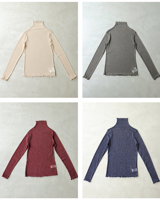 A sheer inner top with a subtle veil that hugs your skin