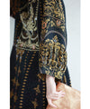 A long dress with beautiful oriental decorations