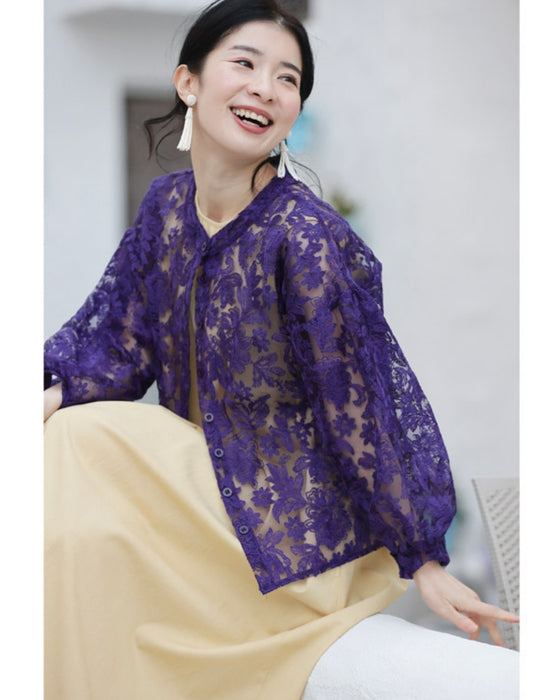 An elegant blouson with an embroidered veil that blooms all over