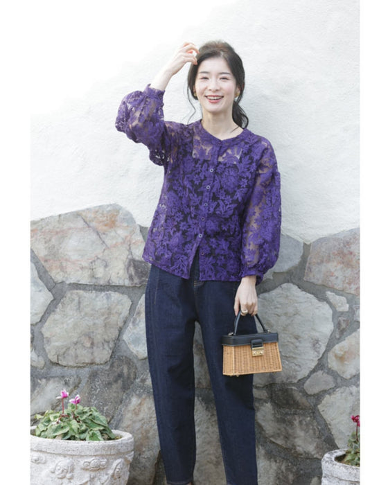 An elegant blouson with an embroidered veil that blooms all over