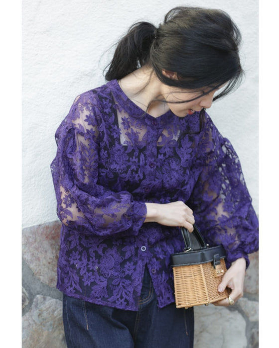 An elegant blouson with an embroidered veil that blooms all over