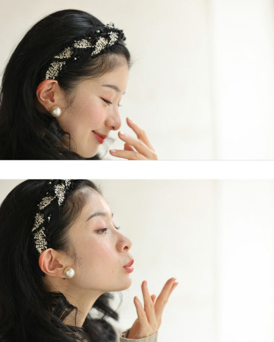 A twisted headband made of different materials and decorated with jewels