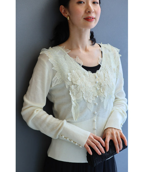 A cut-and-sew top with plenty of floral lace that blooms in a three-dimensional way