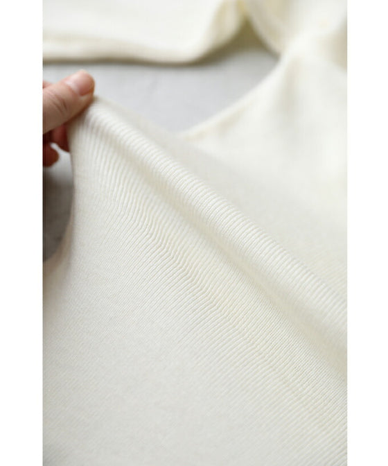 A cut-and-sew top with plenty of floral lace that blooms in a three-dimensional way