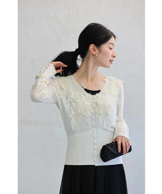 A cut-and-sew top with plenty of floral lace that blooms in a three-dimensional way