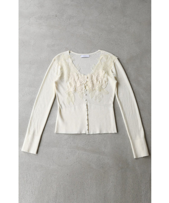 A cut-and-sew top with plenty of floral lace that blooms in a three-dimensional way