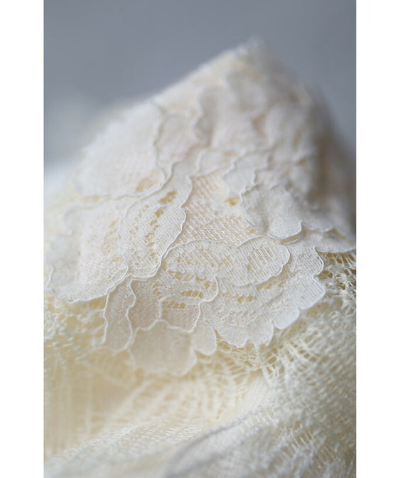 A cut-and-sew top with plenty of floral lace that blooms in a three-dimensional way