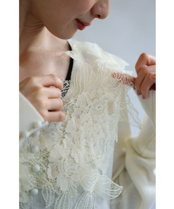 A cut-and-sew top with plenty of floral lace that blooms in a three-dimensional way