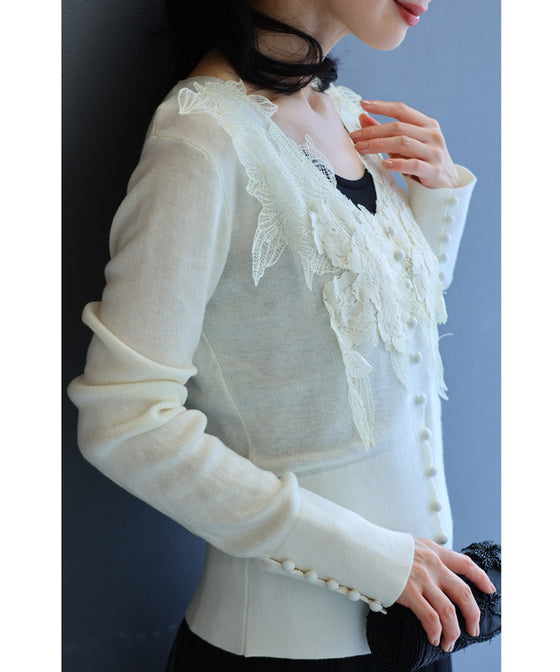 A cut-and-sew top with plenty of floral lace that blooms in a three-dimensional way