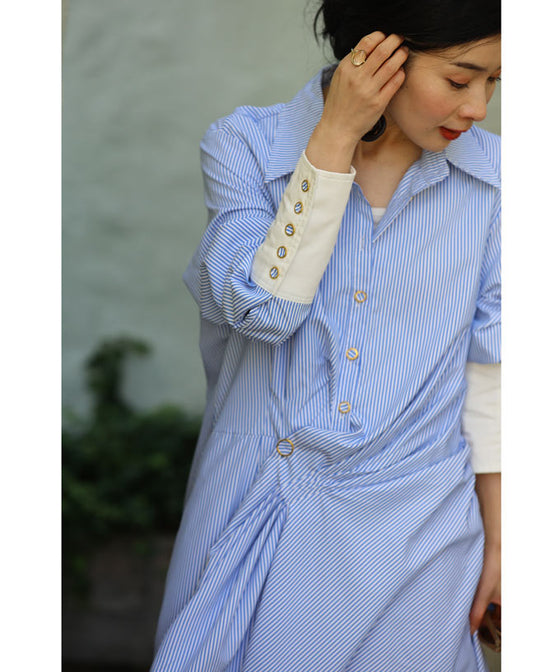 Asymmetrical draped shirt tunic fluttering in the fresh breeze