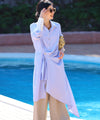 Asymmetrical draped shirt tunic fluttering in the fresh breeze