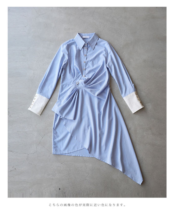 Asymmetrical draped shirt tunic fluttering in the fresh breeze