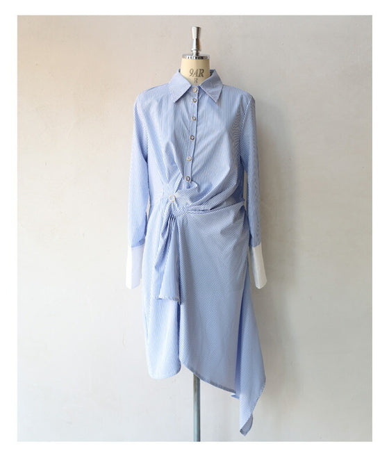 Asymmetrical draped shirt tunic fluttering in the fresh breeze