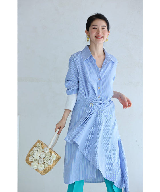 Asymmetrical draped shirt tunic fluttering in the fresh breeze
