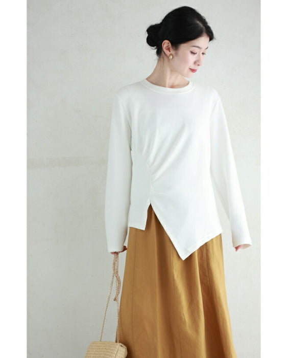 アシンメトリーなカーブタックのカットソートップス