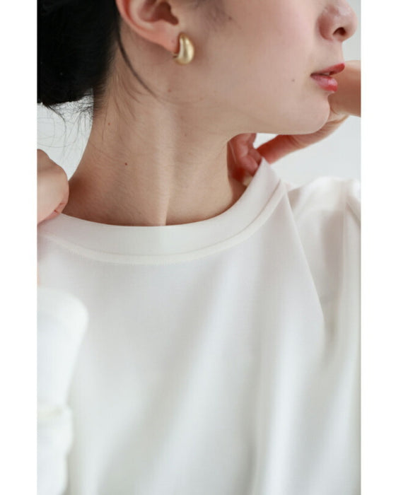 アシンメトリーなカーブタックのカットソートップス