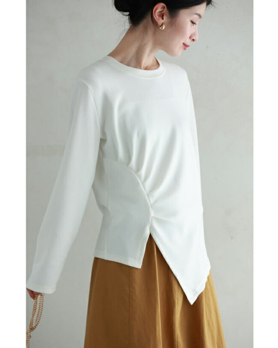 アシンメトリーなカーブタックのカットソートップス