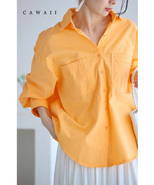  ジューシーなオレンジシャーベットカラーシャツトップス