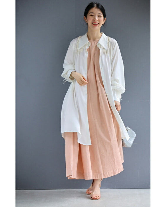 襟袖に揺れるデコレーションパールのロングシャツ