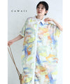 A watercolor art shirt dress with an asymmetrical design that captivates on both sides