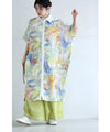 A watercolor art shirt dress with an asymmetrical design that captivates on both sides
