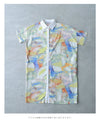 A watercolor art shirt dress with an asymmetrical design that captivates on both sides