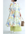 A watercolor art shirt dress with an asymmetrical design that captivates on both sides