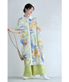 A watercolor art shirt dress with an asymmetrical design that captivates on both sides