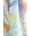 A watercolor art shirt dress with an asymmetrical design that captivates on both sides