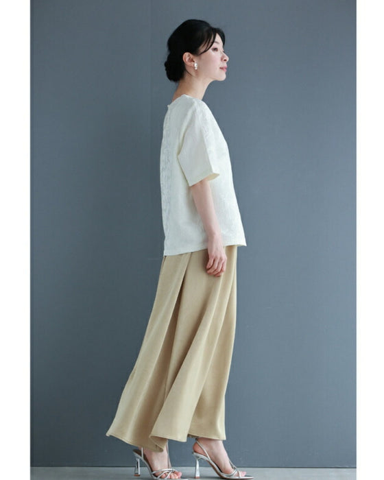 Pullover top with floating leaf pattern and relief effect